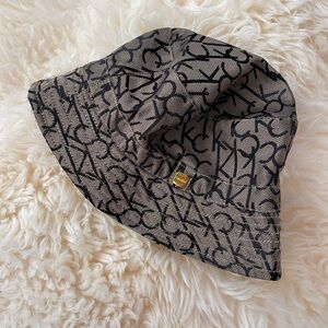 Calvin Klein Black and Gold Bucket hat